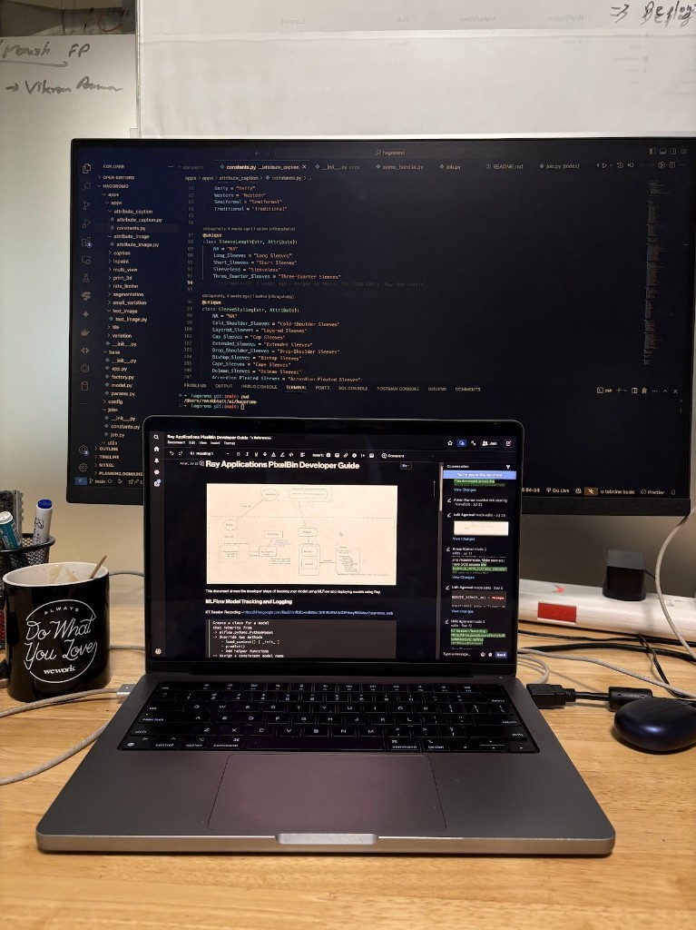 Ronak’s work desk with laptop and monitor showing machine learning code